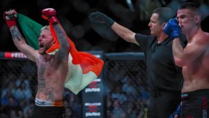 James Gallagher ufc win flag raising in hands