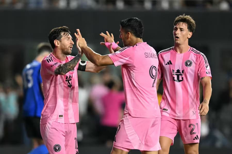 Messi’s celebrates with Suarez