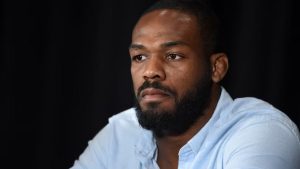 Jon Jones in white shirt
